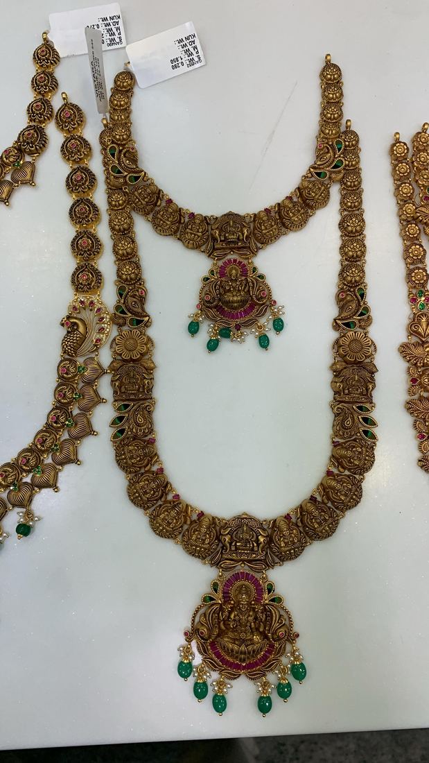 Antique-finish Lakshmi haram set with stones and green beads