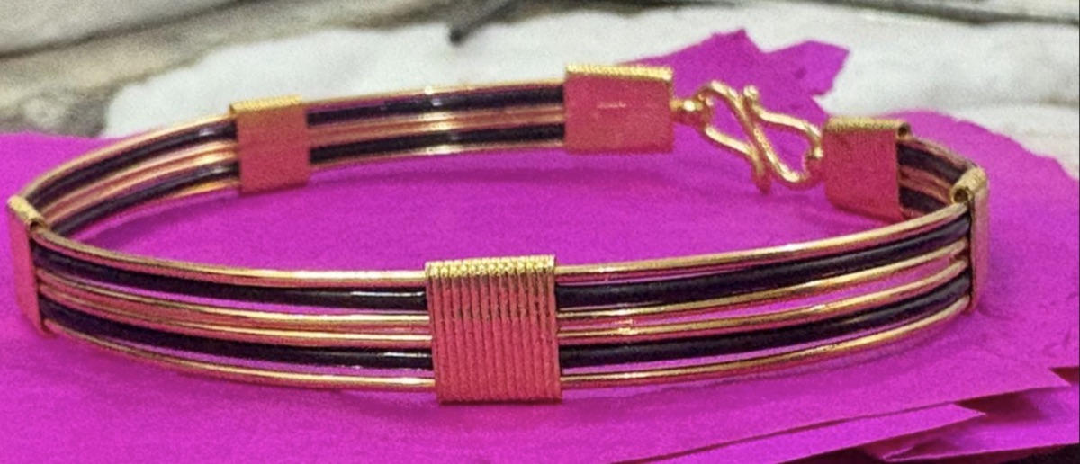 Gold bracelet with a hook clasp