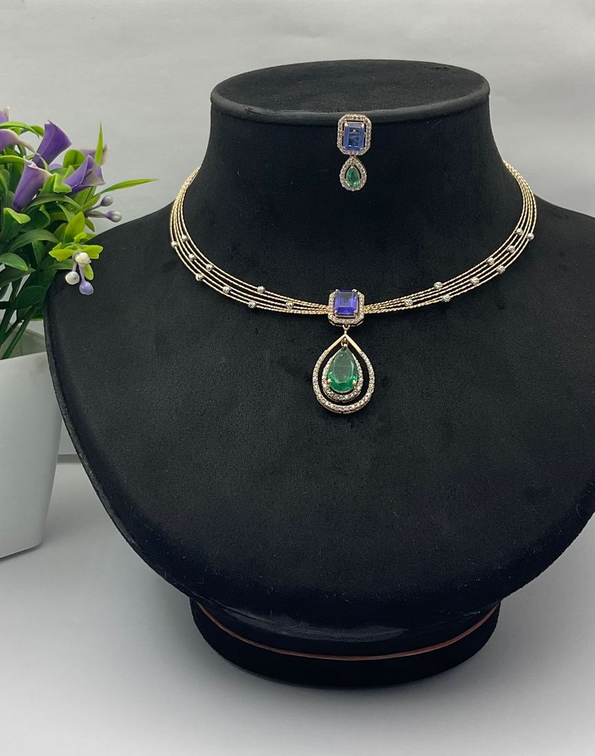Diamond necklace with green drop pendant and maang tikka