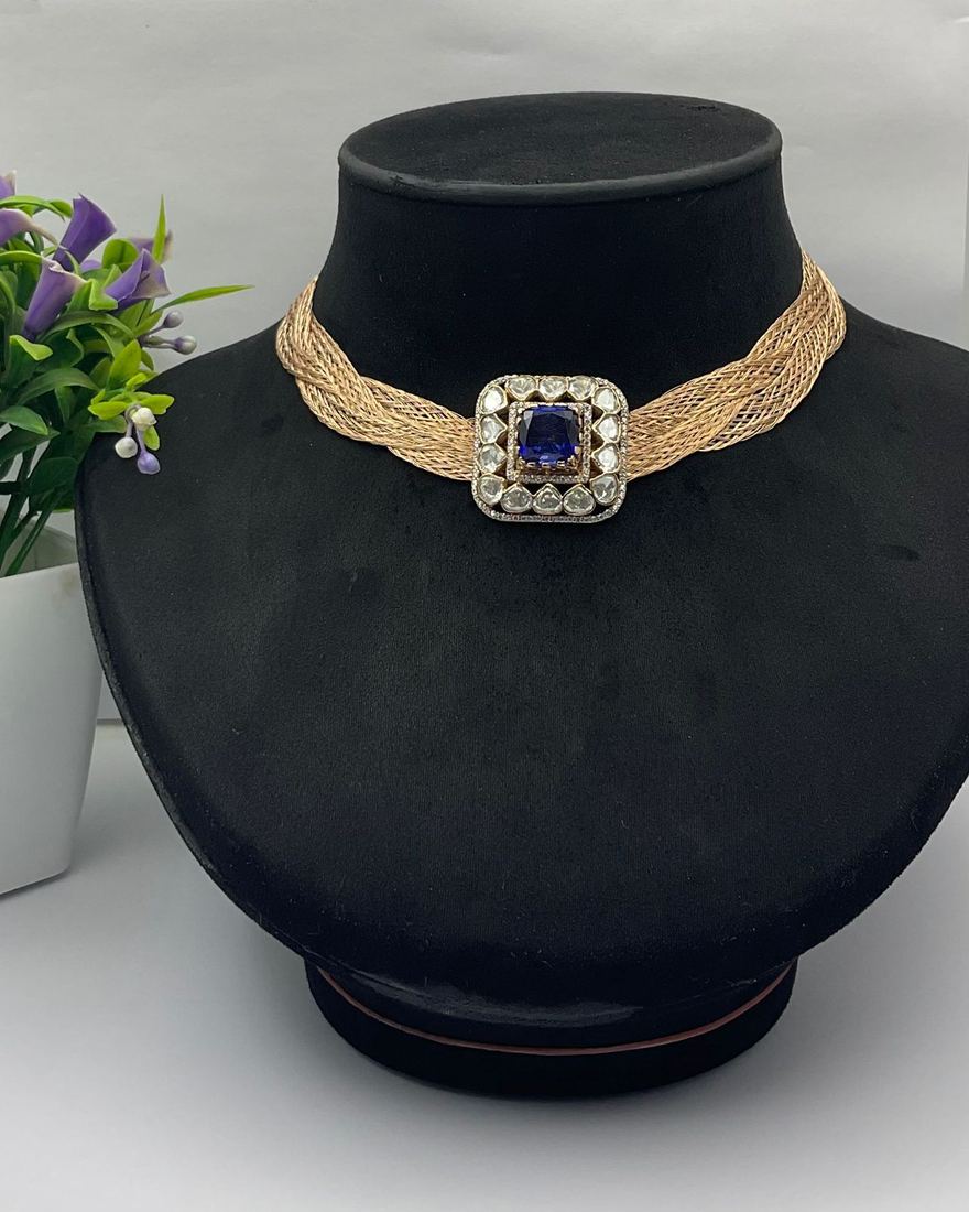 Diamond choker with blue stone centre piece