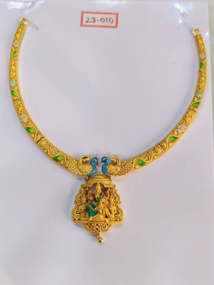 Gold temple necklace with peacocks and Lakshmi pendant