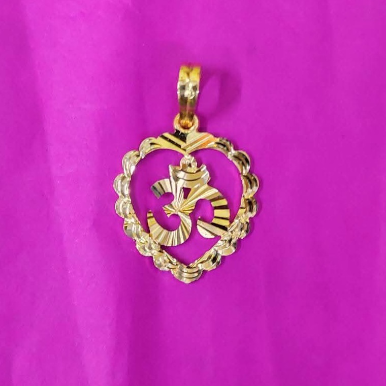 Gold Om pendant in a heart frame
